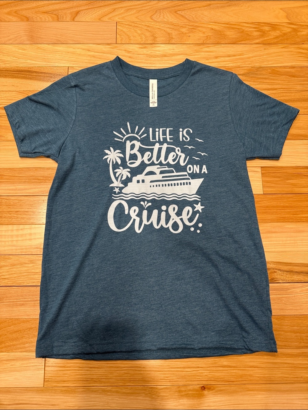 Bella Canvas Blue Kids Tee with White 'Life Is Better on a Cruise' Graphic